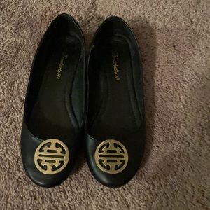 Breckelle’s black flats with gold metal